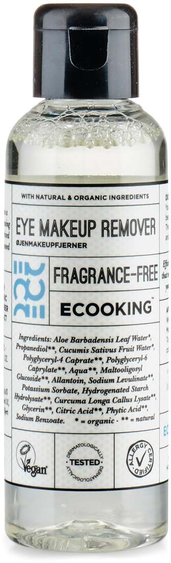 Clear bottle of eye makeup remover with a black cap, labeled as fragrance-free and eco-friendly.