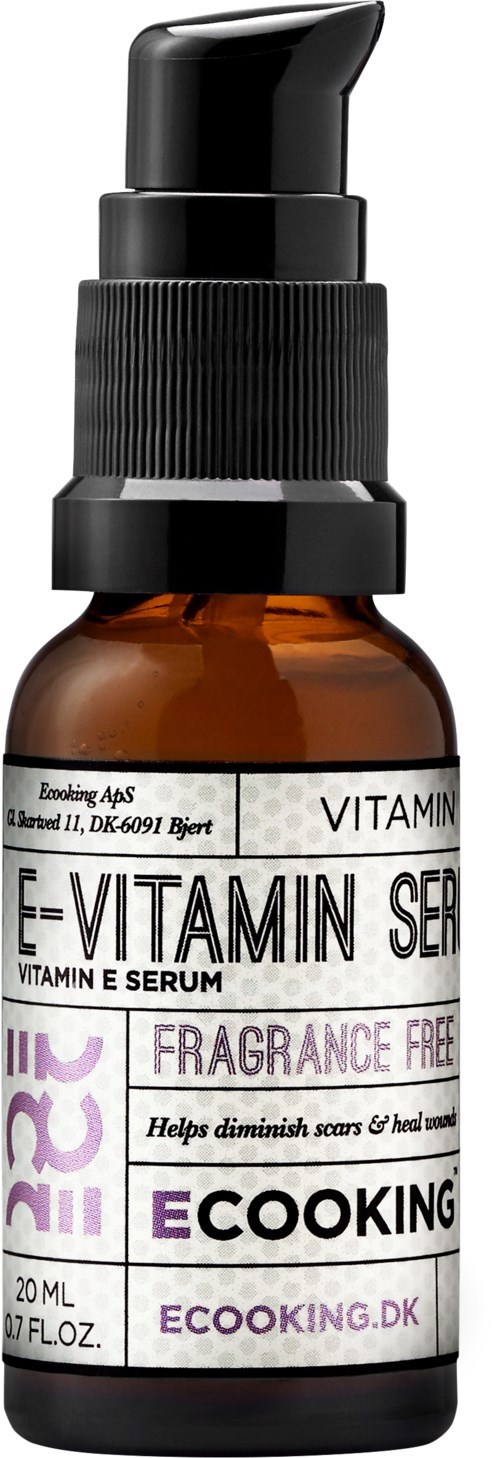 Liten brun flaske med svart pumpe, merket som vitamin E-serum, uten parfyme, hjelper med sårheling.