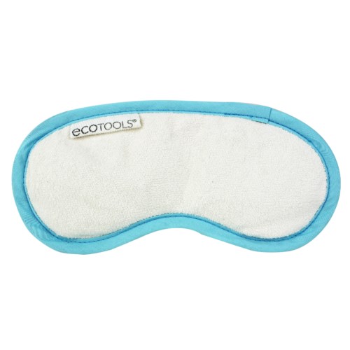 A soft eye mask with blue trim and a label 'ecotools' inside.