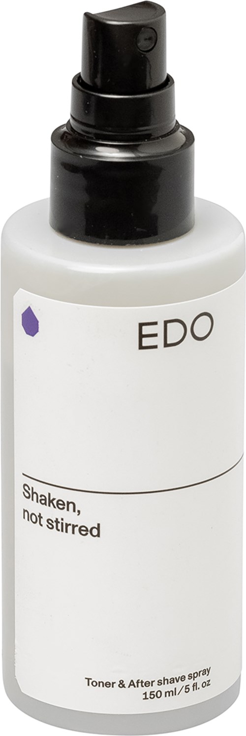 Een witte sprayfles met zwarte dop en pomp. Het heeft eenvoudige tekst en een klein paarse druppel-icoon.
