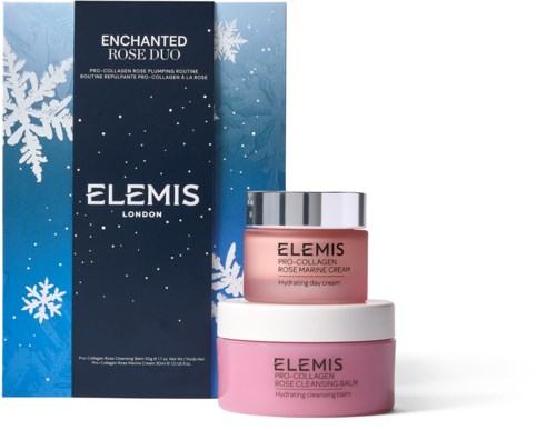 Kaksi ihonhoitopurkki ja laatikko nimeltä Enchanted Rose Duo, suunniteltu kosteuttamaan ja puhdistamaan ihoa. Jouluteemainen pakkauksen.