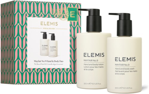 Two bottles of hand and body lotion with a decorative box behind them.