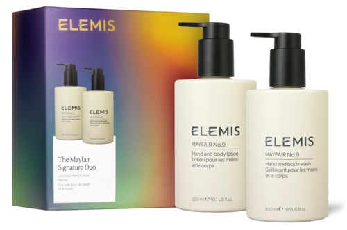 Kaksi valkoista pulloa, joissa lukee Elemis Mayfair No.9, ovat edessä värikkään boxin edessä. Ne ovat käsiväri- ja vartalovoiteet.