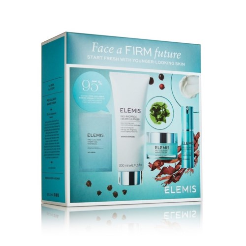 En hudpleiesettboks med kremer og produkter for fast hud, med naturlige ingredienser som blader og bær.