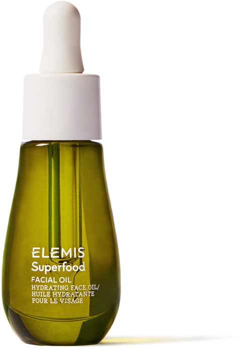 En grön glasflaska med vit pipettlock som innehåller Elemis Superfood ansiktsolja.