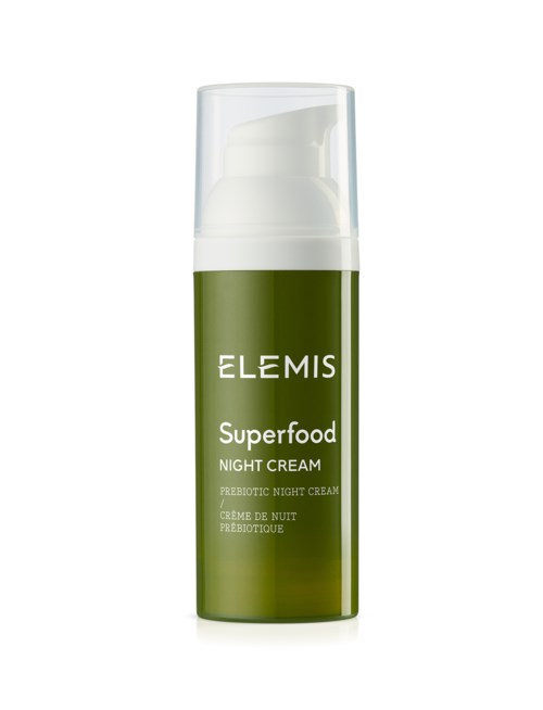 En grønn flaske med Elemis Superfood Night Cream og hvit hylse.