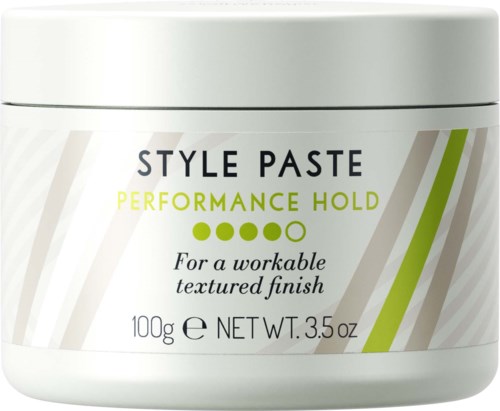 Een witte pot met groene en grijze accenten, gelabeld als style paste voor textuurlijke afwerking, weegt 100g.
