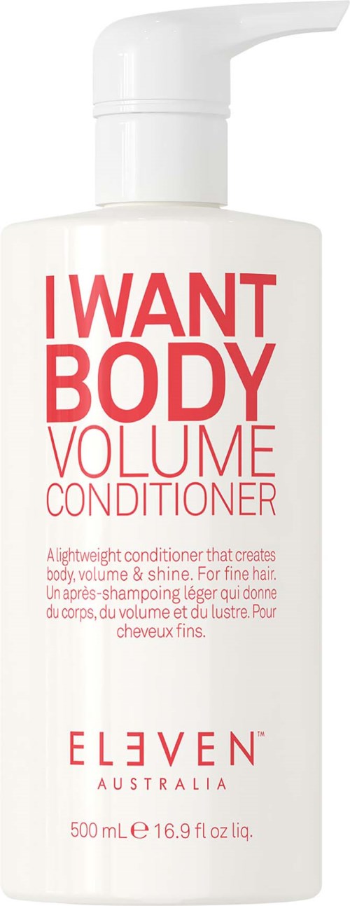 En hvid flaske med pumpe mærket "I WANT BODY VOLUME CONDITIONER" fra ELEVEN Australia, 500 ml størrelse.
