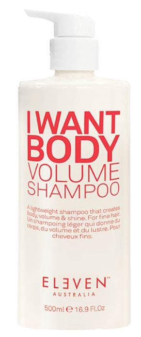 A white bottle with a pump, labeled 'I WANT BODY VOLUME SHAMPOO', from Eleven Australia, 500ml.