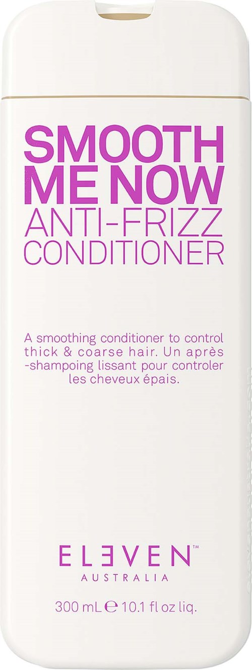 En vit flaska av Eleven Australia Smooth Me Now anti-frizz balsam med lila text.