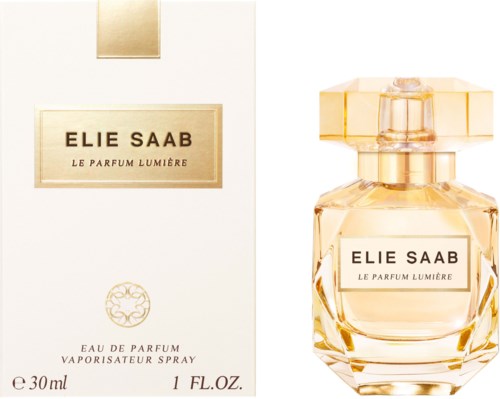 En parfymeflaske og eske av Elle Saab Le Parfum Lumière, med gulldetaljer og en klar glassflaske.