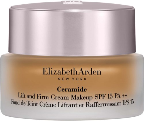 Een pot Elizabeth Arden Ceramide Lift and Firm Cream met SPF 15, in een beige container met een zilveren deksel.