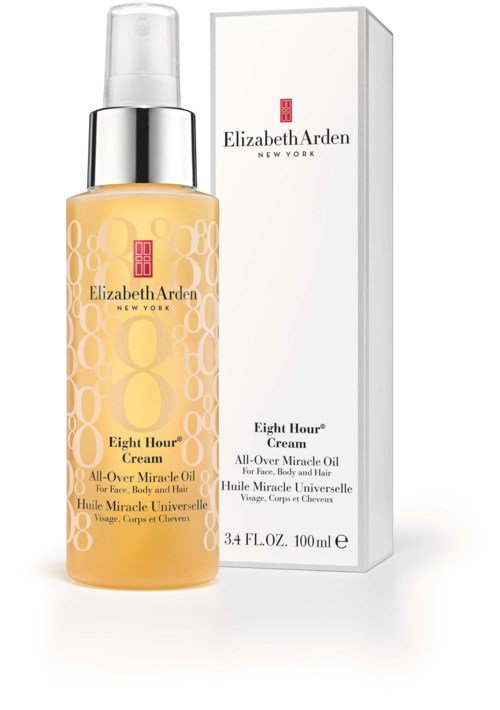 En gul flaska med Elizabeth Arden Eight Hour Cream och en vit förpackning bredvid.