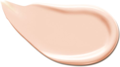 En jevn beige væske i en tåreformet form med glatt, skinnende overflate.
