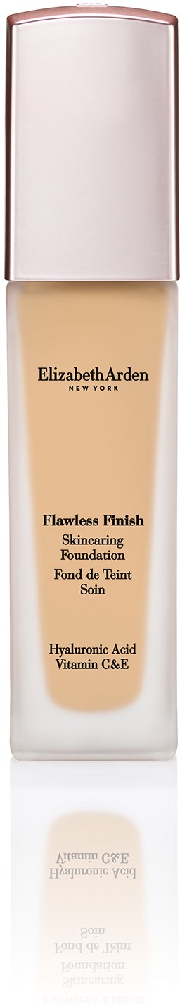 En flaske Elizabeth Arden Flawless Finish Skincaring Foundation med hvit hette og beige væske inni.