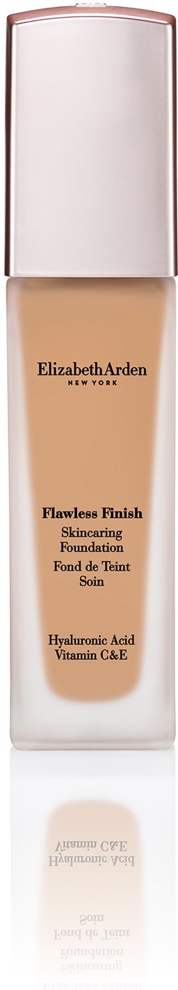 En flaske med Elizabeth Arden foundation med hvit kork og beige væske inni.