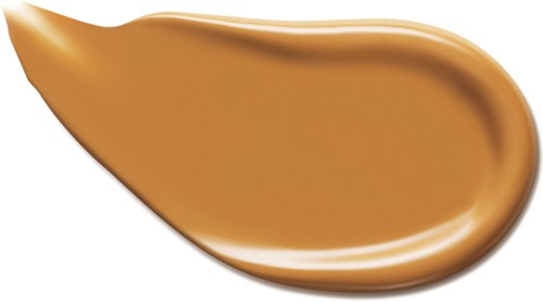 Een spiraal van karamelsaus met een glatte, glanzende oppervlakte en een rijke kleur.