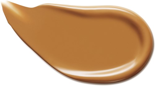 En glatt, skinnende stripe av lysebrunt spredt på svart bakgrunn, som ligner på saus eller krem.