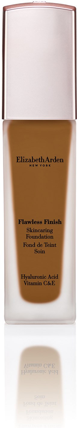En flaske med foundation med sølvhette, merket Elizabeth Arden, kalt Flawless Finish, inneholder hyaluronsyre og vitamin C&E.