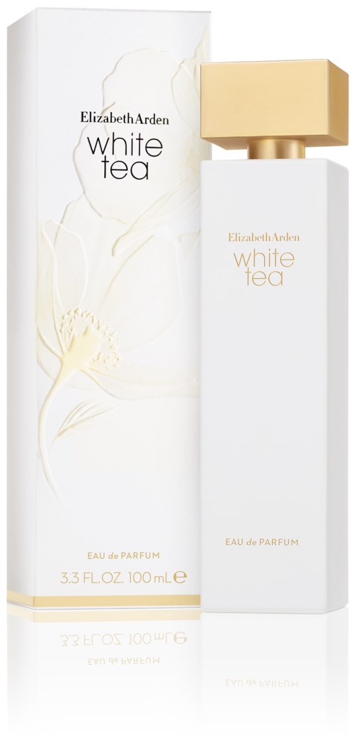 En vit parfymflaska med guldlock, lådside med blommönster, och etikett säger 'White Tea' av Elizabeth Arden.