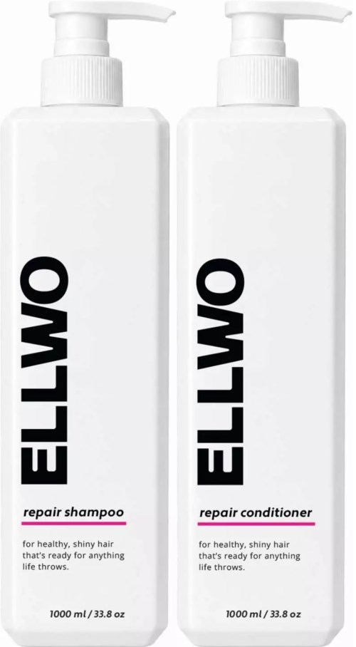 To hvite flasker med Elimo hårpleieprodukter, reparasjonsshampo og balsam, med svart og rosa tekst og pumpebeskyttere.