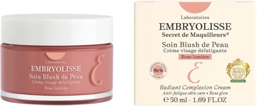 En burk och förpackning av Embryolisse Rose Lumière moisturizer för huden med anti-aging och glow fördelar.
