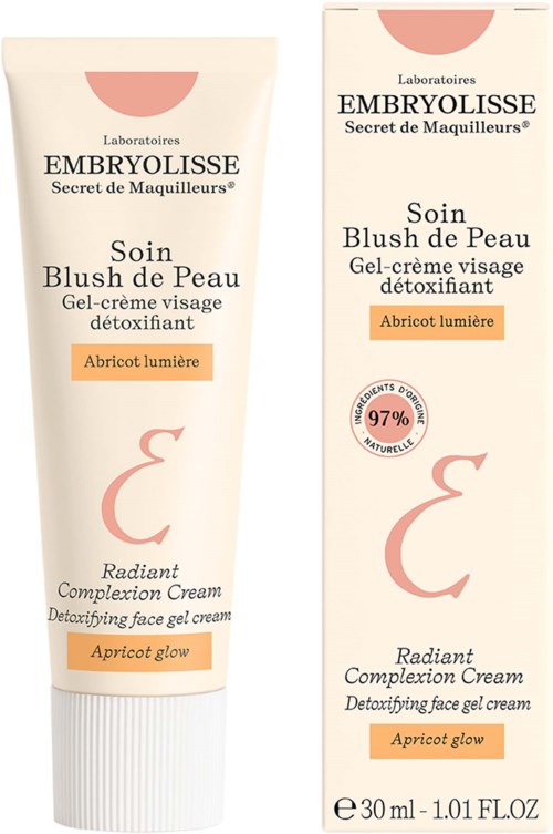 En tube og eske med Embryolisse ansiktskrem for å lysne huden med aprikosglans, 30 ml.