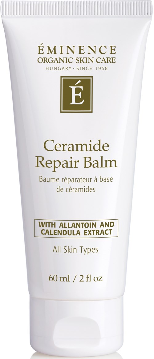 Biała tubka oznakowana Eminence Ceramide Repair Balm, z złotymi literami i detalami, dla wszystkich typów skóry, zawiera 60 ml.