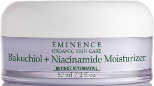Ett burk med Eminence fuktighetskräm med gröna och lila texter, märkt som Bakuchiol och Niacinamide Moisturizer.