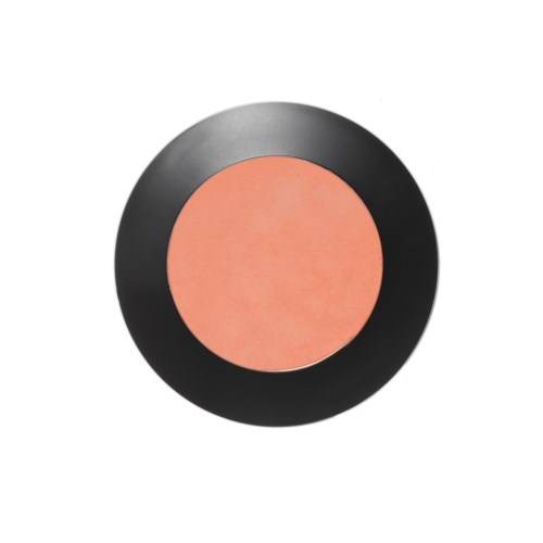 En rund makeupprodukt med rosa blush i ett svart lock.