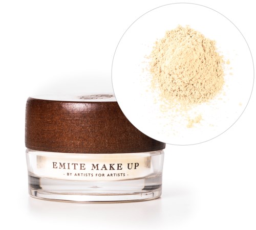 A small makeup jar with a wooden lid and loose powder inside. The label shows it's from Emite Make Up.