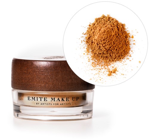 A small jar of makeup cream with a brown lid, and a heap of brown powder, possibly foundation or blush.