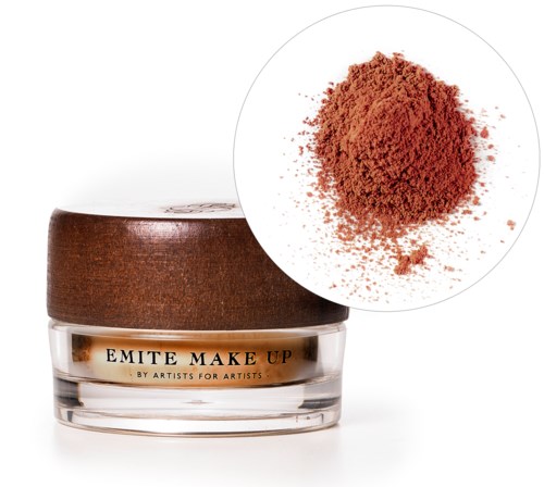 A jar of Emite Make Up with brown powder, close-up shows the powder's texture and color.