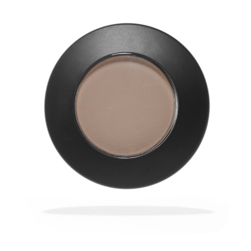 En rund beholder med beige sminke inni og svart ytterkant.