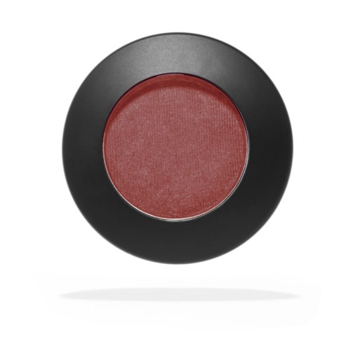 A round makeup blush container with a reddish-pink blush inside and a black outer case.