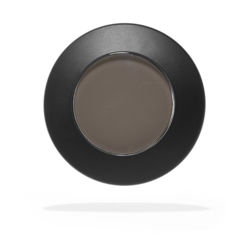 A black circular object with a gray center, possibly a compact mirror or a small plate.