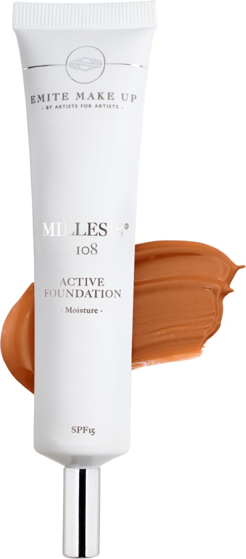 A white tube with text, a brown foundation swatch behind it, and a shiny silver applicator.