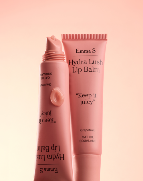 Roze tube met Emma S Hydra Lush Lip Balm met slogan Keep it juicy en ingrediëntenlijst.