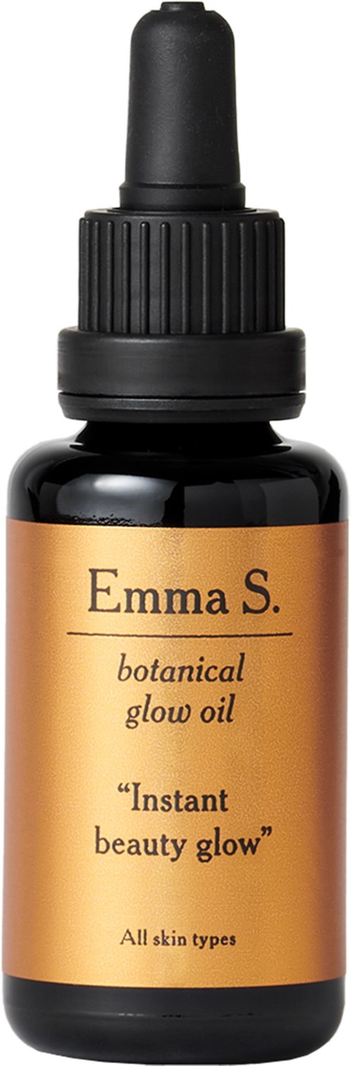 En lille sort flaske med dråbetud, mærket 'Emma S. botanical glow oil' til alle hudtyper.