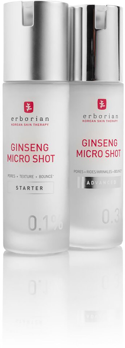 Two small bottles labeled Ginseng Micro Shot with silver caps and white labels. They are part of skincare or health products.