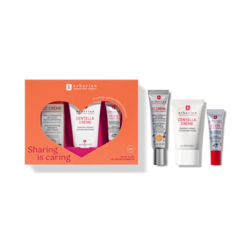 A skincare set with three tubes and a box, some tubes are inside the box and others outside, labeled in French.