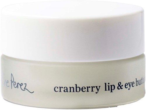 En liten krukke med hvit lokk, merket 'cranberry lip & eye butter' og en signatur under.