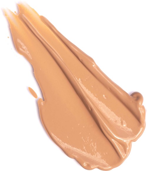 Et tykt lag af beige væske, glat og cremet, spredt på en hvid overflade.