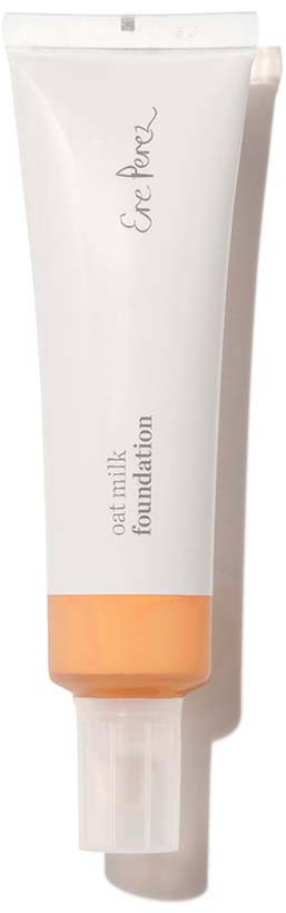 En vit tub med orange botten med texten 'Oat Milk Foundation'.