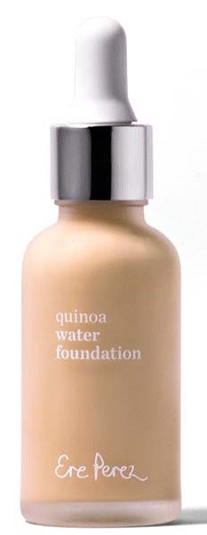 A bottle of liquid foundation with a dropper, labeled 'quinoa water foundation' by Ere Perez.