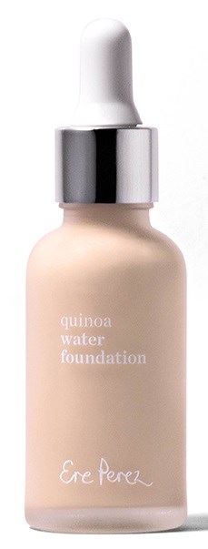 En liten flaska med droppkork, märkt som quinoa water foundation av Ere Perez.