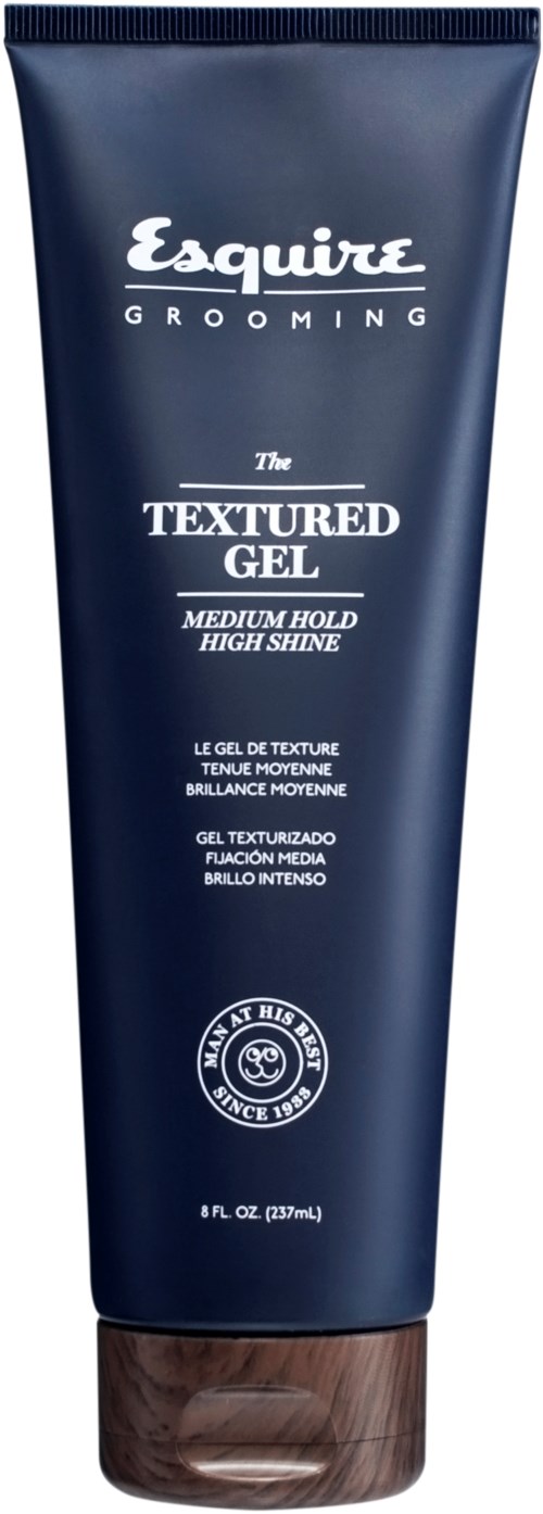 Blå tub med Esquire Grooming textureringsgel och brunt lock, beskriven som medium hållfasthet och hög glans.