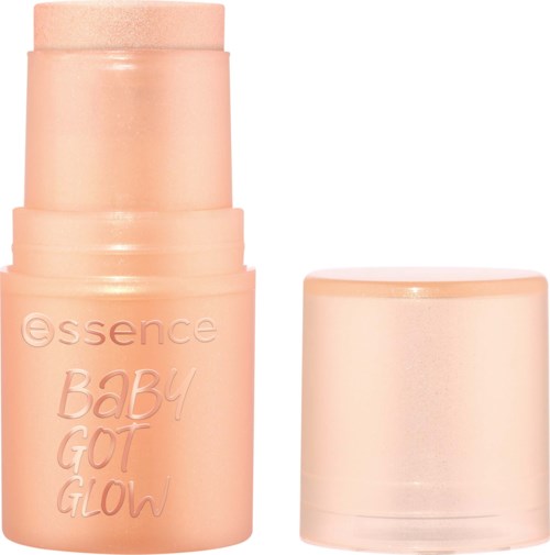 Peach-colored tube of essence baby glow makeup with a removable cap next to it.