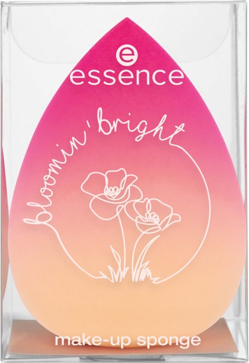 A pink and orange makeup sponge in a clear box, with the words 'essence' and 'bloomin' bright' written on it.