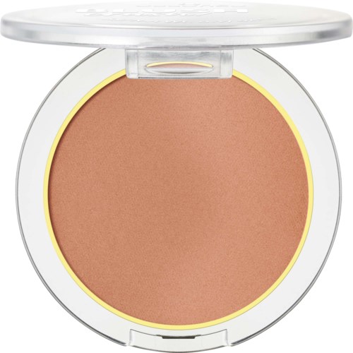 En rund makeup-kompakt med hudfärgad puder och ett genomskilligt lock. Kompaktens omkrets har en gul ring.